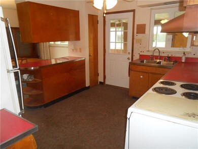 Door leads to the enclosed sun room