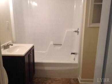 Reglazed tub, new vanity & sink and vinyl flooring.