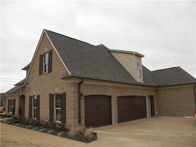 Triple side load garage with friend entry door