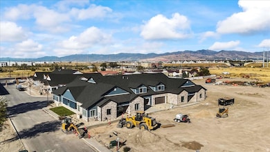 Aerial perspective of suburban area with a mountain backdrop