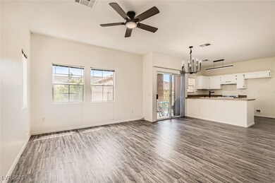 Living room with dark wood finished floors, plenty