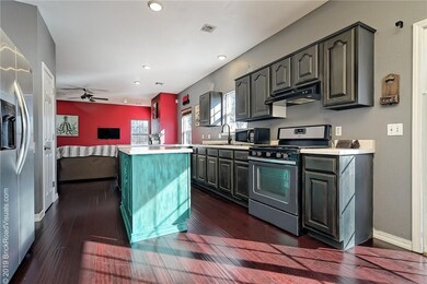 Spacious kitchen with stainless appliances