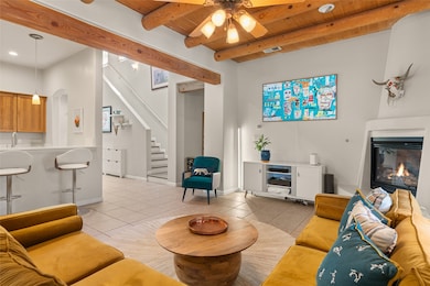 Living Room w/ Gas Fireplace (looking to Entry Hall)