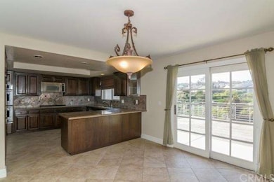 Another view of the kitchen and the sliding doors 