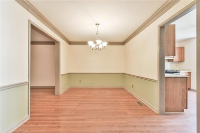 Unfurnished dining area featuring an inviting chan
