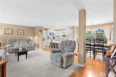 Front door into living room/kitchen/dining area