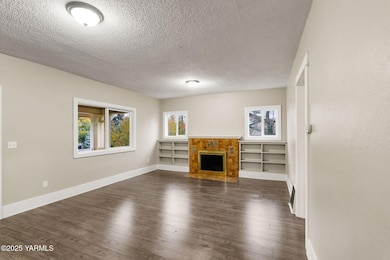 Living Room w/Fireplace & Built-Ins