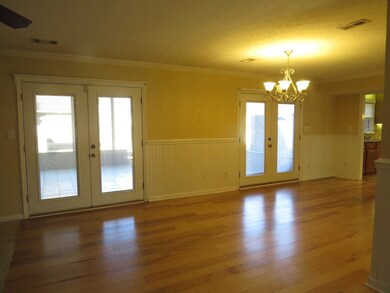 French doors to large screened porch
