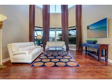Living room off foyer... two-story ceiling... lots