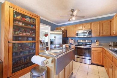 This updated kitchen has stainless steel appliances, a modern ceiling fan and lots of cabinet space! You will love this custom spice rack/cabinet! 2221 Red Mile Rd, Murfreesboro, TN 37130