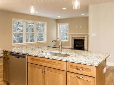 Kitchen with view into living room