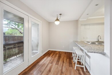 Breakfast area with extended granite countertop fo