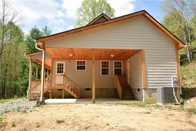 View from the Carport End of the Home (The Driveway wraps around this side)