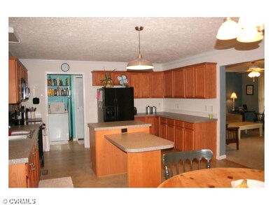 Kitchen - It has a great bar/island area which wil