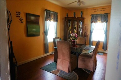Dining room is spacious, laminate hard wood flows 