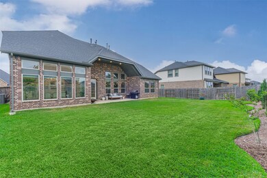 Your 10,000+ square foot lot will be the envy of your friends! Custom landscaping has been added, and there is more room for a future swimming pool, play structure, or additional gardens.