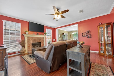 Large Family Room has crown molding.