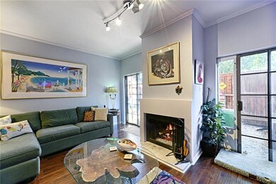 The wood burning fireplace is a focal point for th