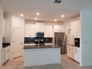 5604 Quiet Palm Loop, Saint Cloud, FL 34771 - photo 4