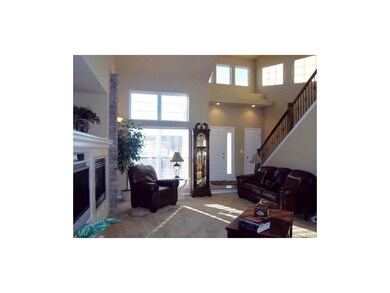 911 Dogwood Dr, Raymore, MO 64083 - photo 2