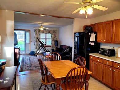 Kitchen looking into living room