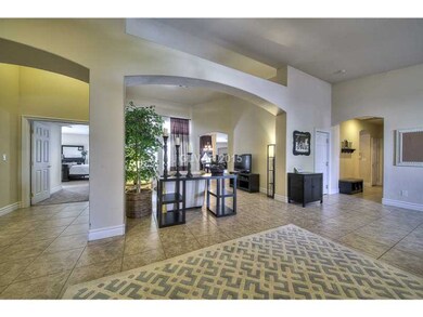 Living Room. Entry way with view to Master bedroom