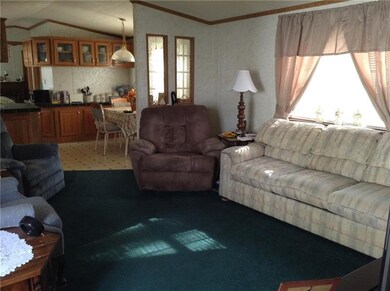 Open floor plan of living room, dining room and ki