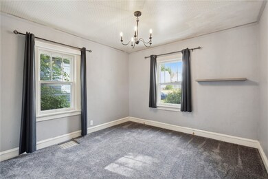 Main floor bedroom, fresh paint & new carpeting