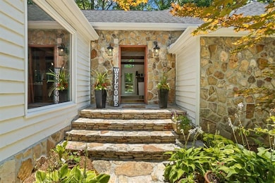 idyllic stone entry and walkway welcoming guests