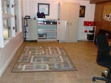 Finished Game Room is 18' X 11' and opens out under the deck.