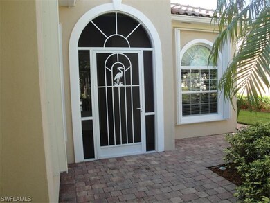 Custom screened enclosure at fron entrance.