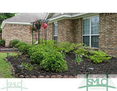 Exterior Front. Beautiful manicured gardens...