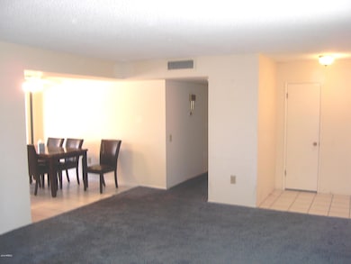 LIVING ROOM/DINING ROOM VIEW TO KITCHEN