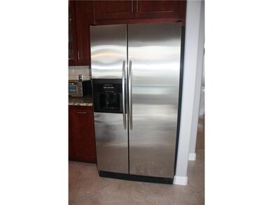 Den/Family/Great Room. Glass sliding doors leads f
