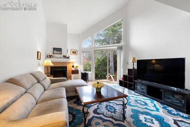 Living Room Featuring High Vaulted Ceiling