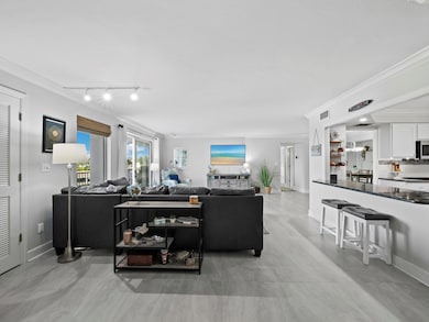 You are immediately met with a bright open space with beautiful flooring, an open kitchen and garden views.