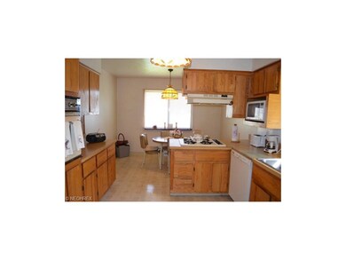 Updated eat in kitchen with plenty of cupboard and