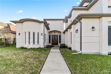 Entrance to property with a yard