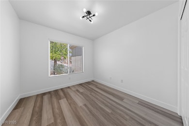 2nd Bedroom featuring baseboards and Luxury vinyl
