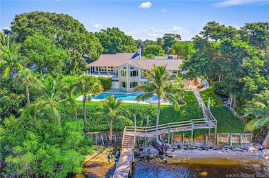 Set on a .73 Acre Deep Water Ocean Access Lot, on