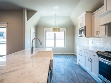 Kitchen with light and bright Breakfast Room.