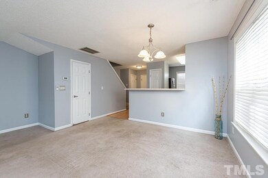 Door leads to half bath with pedestal sink.