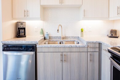 Kitchen featuring sink, stainless steel dishwasher