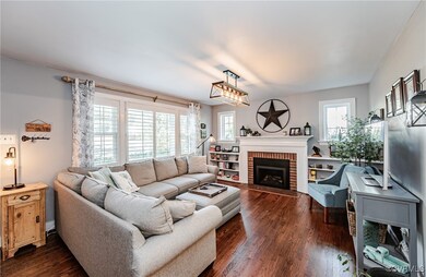 Generous living room with plantation shutters