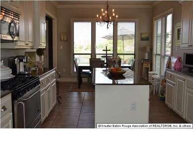 Kitchen- Granite countertops, stainless appliances, 6 burner gas stove, 18