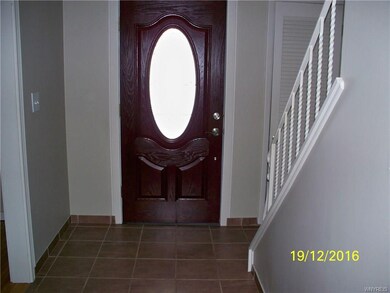 Main front entry.Note lovely tile flooring