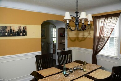 FORMAL DINING ROOM WITH HARDWOOD FLOORS