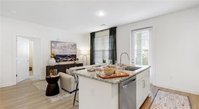 Kitchen featuring light hardwood / wood-style floo
