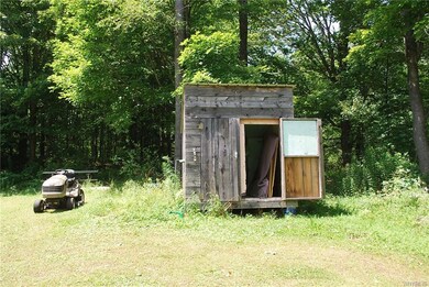 One of the sheds on the property used for storage.