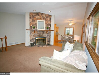 The floor-to-ceiling, stone fireplace will keep yo